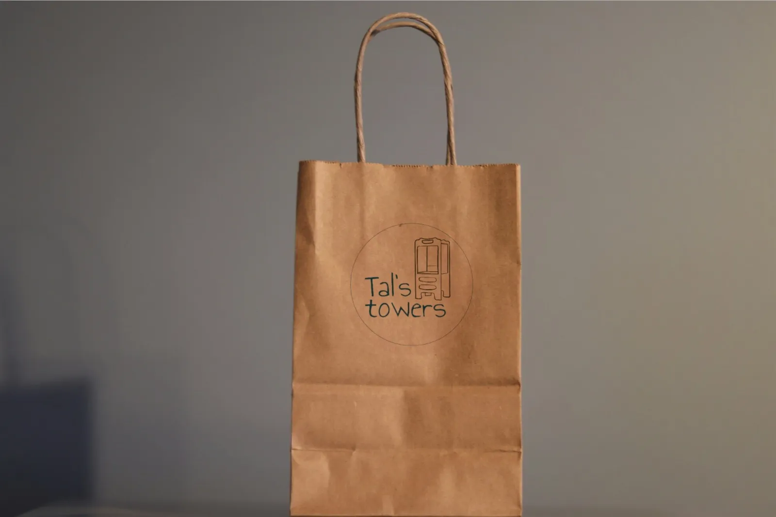 Tal’s Towers logo on a real mockup